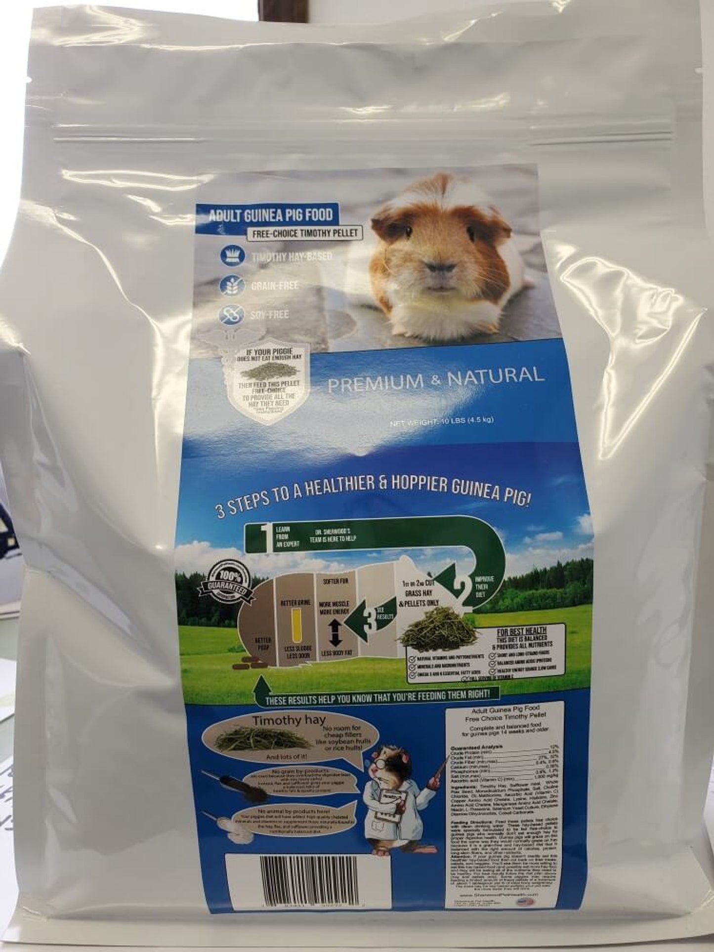 Package of Adult Guinea Pig Food - Free Choice Timothy Pellet with a picture of a guinea pig on the front and information about the product being natural.