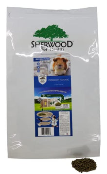 A package of Sheerwood brand adult guinea pig food, featuring a picture of a guinea pig 