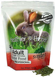 A package of Adult Rabbit Food by Sherwood, which is a professional grade alfalfa-based pellet. The package has a picture of a rabbit on the front.