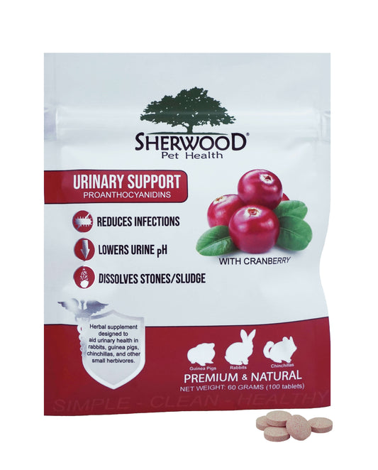 Packaging of Sherwood Pet Health urinary support tablet with cranberry, highlighting benefits such as reducing infections, lowering urine pH, and dissolving stones/slug. The package shows the tablet size, cranberries, and the product as premium and natural.